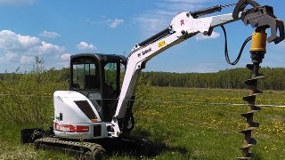 Аренда экскаватора погрузчика с ямобуром в Мончегорск цена от 1574 руб